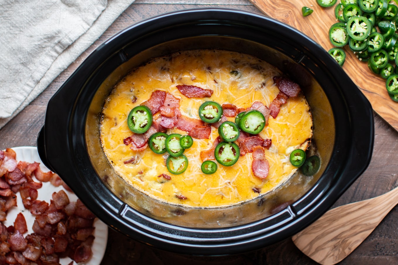 crustless bacon jalapeno quiche in oval slow cooker.