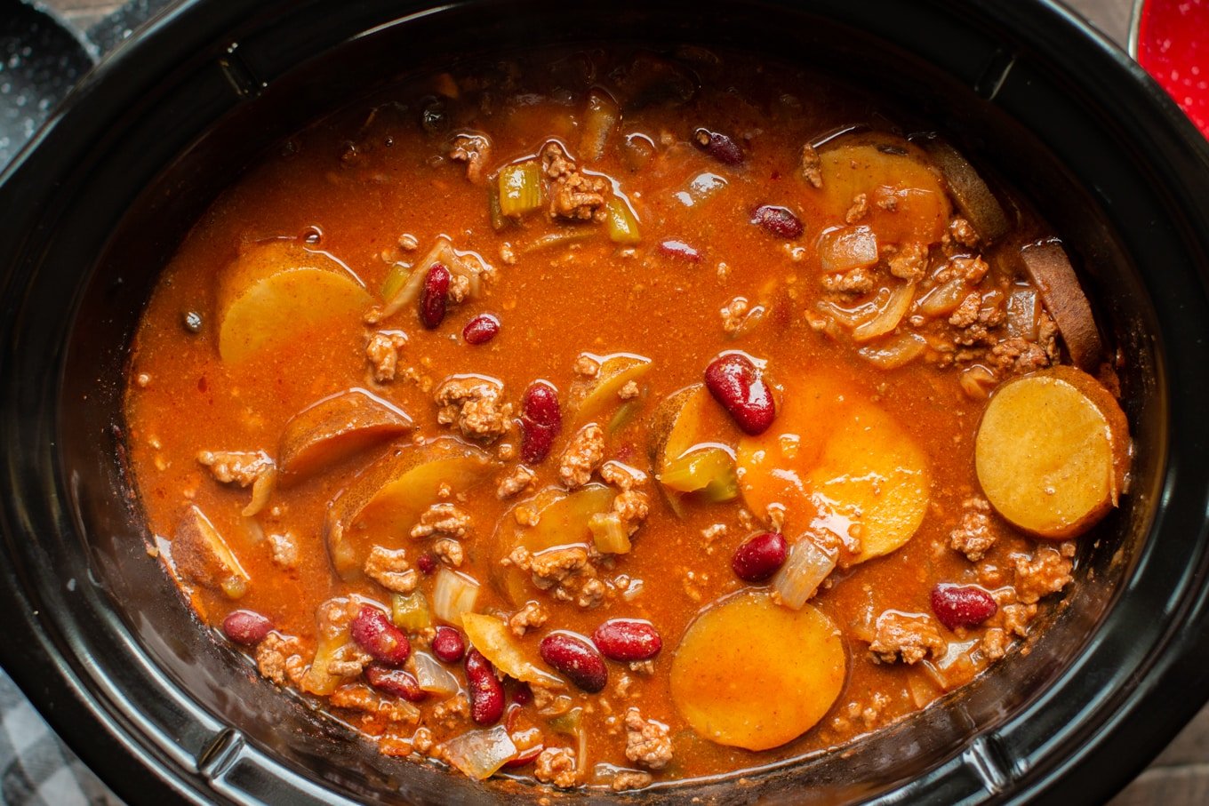 close up of cooked shipwreck stew in a slow cooker.