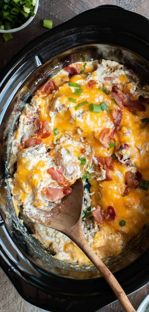 close up of crack chicken in slow cooker