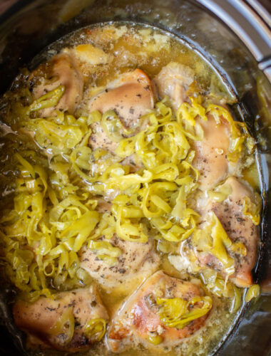 close up of chicken with pepperoncini peppers