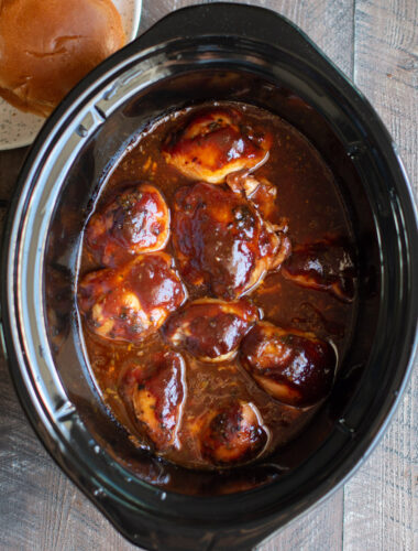 chicken thighs in root beer barbecue sauce in slow cooker.