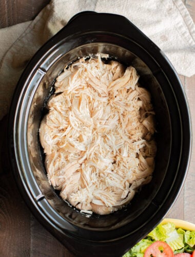 shredded chicken in the slow cooker with a green salad on the side.
