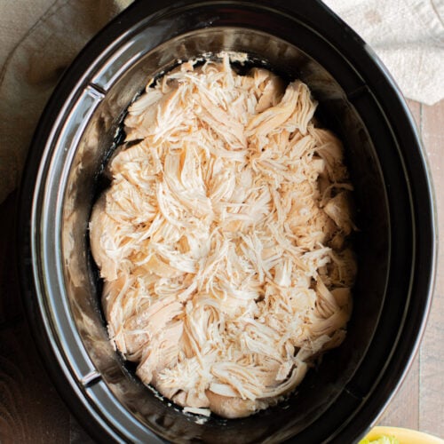 shredded chicken in the slow cooker with a green salad on the side.