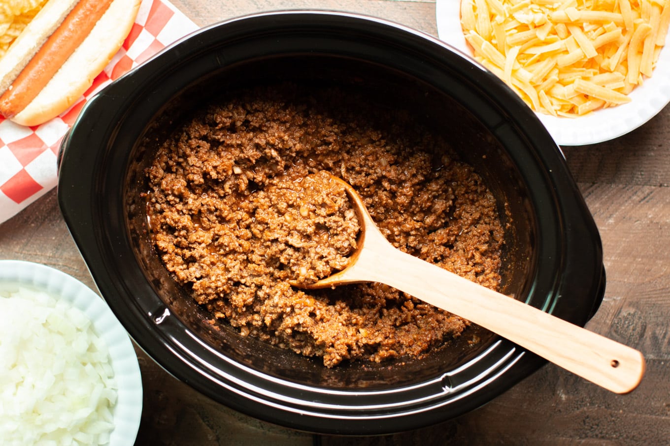 finished cooking hot dog chili in a slow cooker.