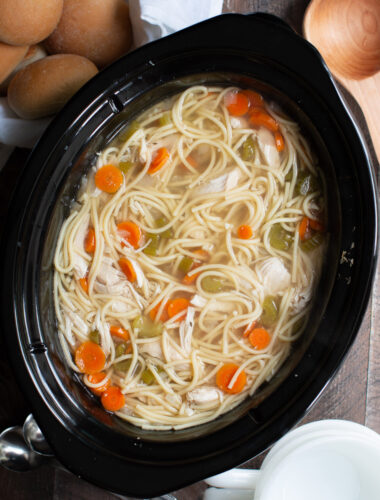 chicken noodle soup in the slow cooker with spaghetti type noodles.