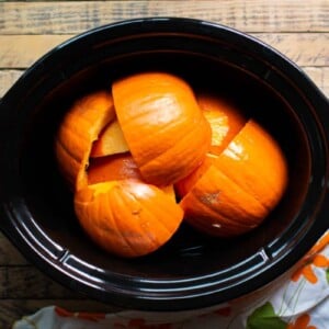 pumpkin pieces in the slow cooker.