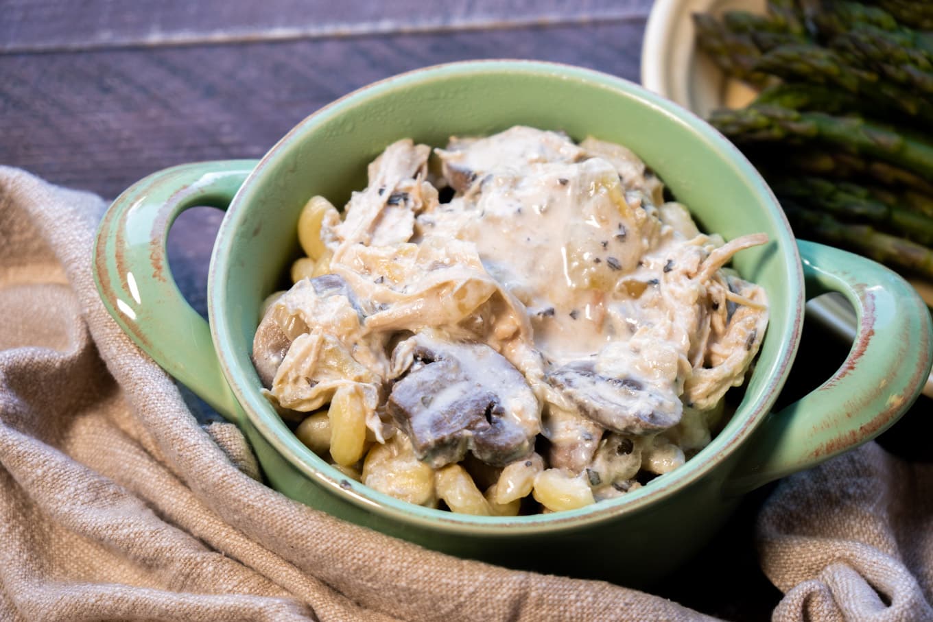 artichoke mushroom chicken in serving bowl