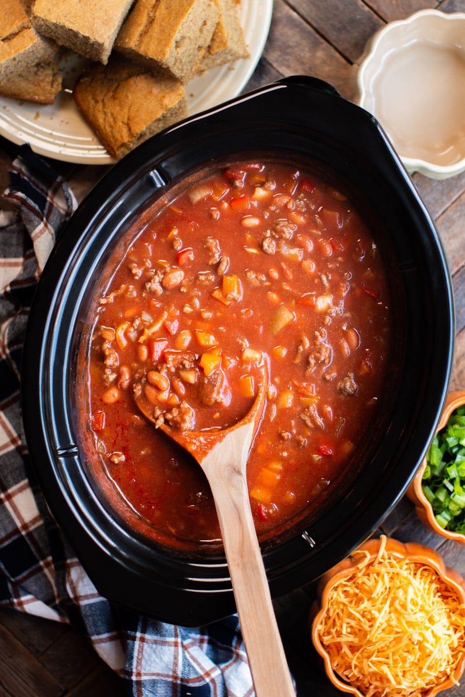 pumpking chili with wooden spoon in it.