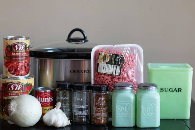 stirred uncooked spaghetti sauce in the slow cooker.