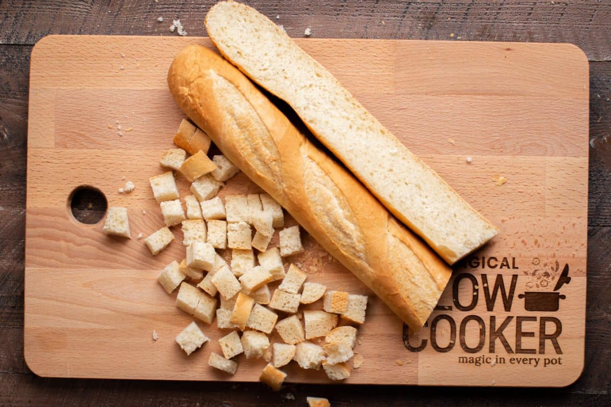 A wooden cutting board, with Bread