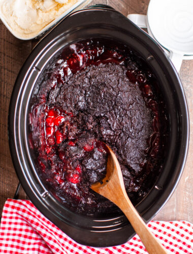 Cherry Chocolate Dump Cake all done cooking with spoon in it