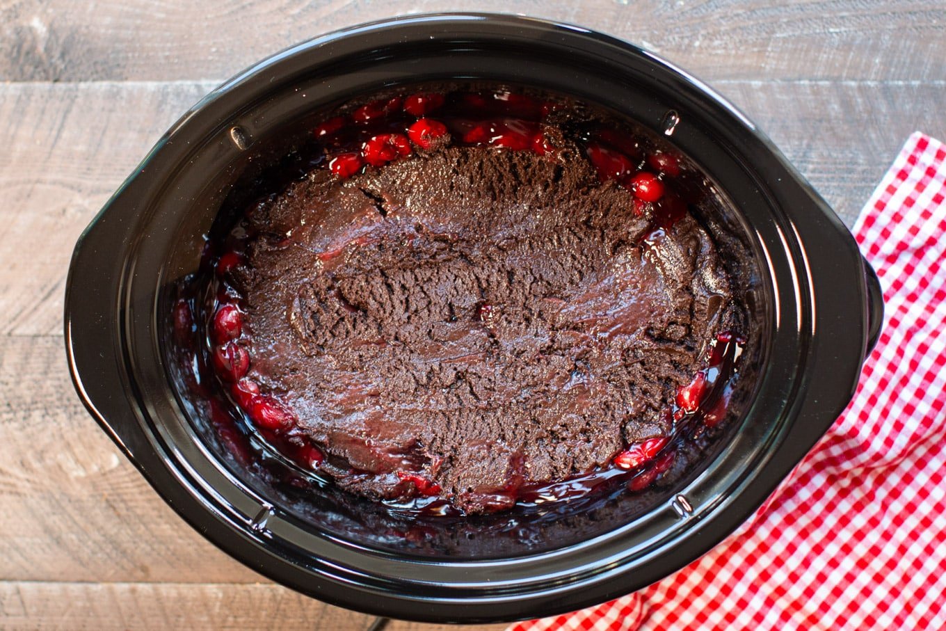 cherry pie filling with raw cake mix (and butter)