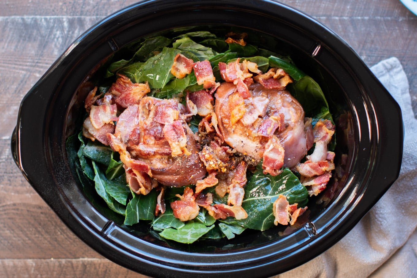 collard greens, ham hocks, bacon in slow cooker uncooked