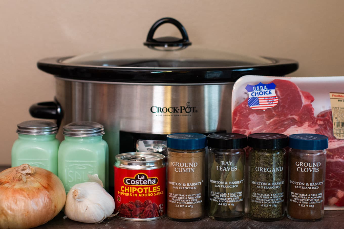 ingredients for barbacoa in front of slow cooker