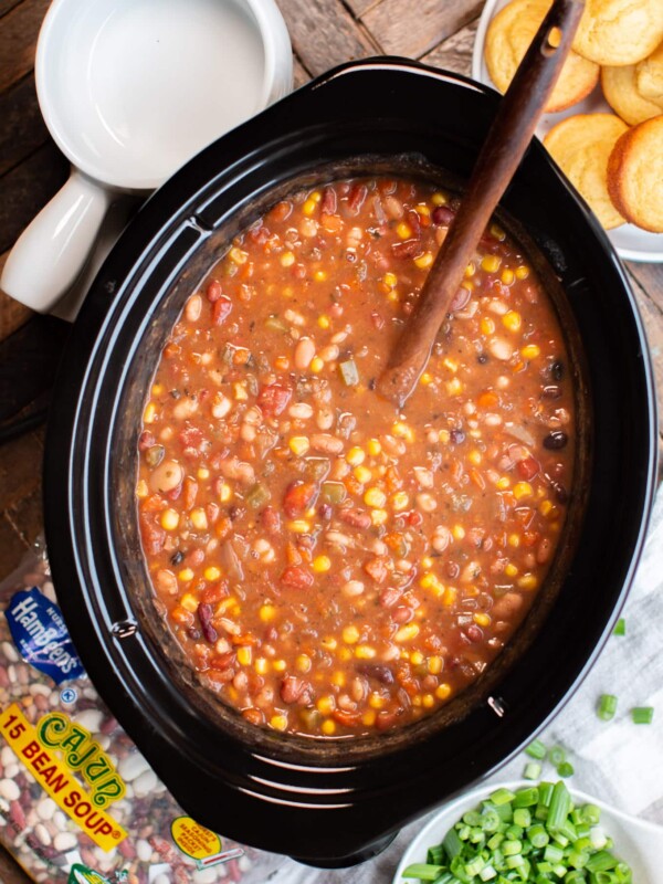 meatless 15 bean soup in slow cooker with spoon in it.
