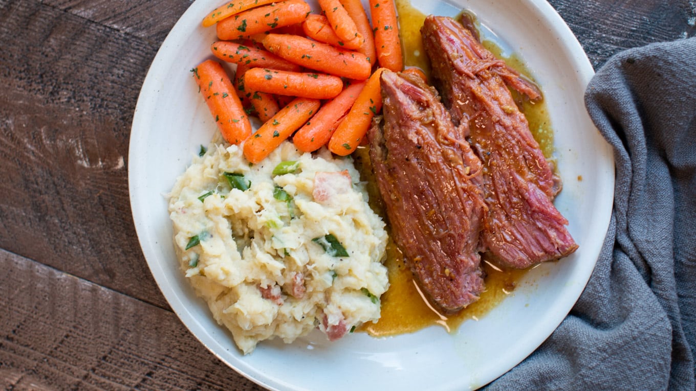 colcannon potatoes on plate with maple mustard corned beef