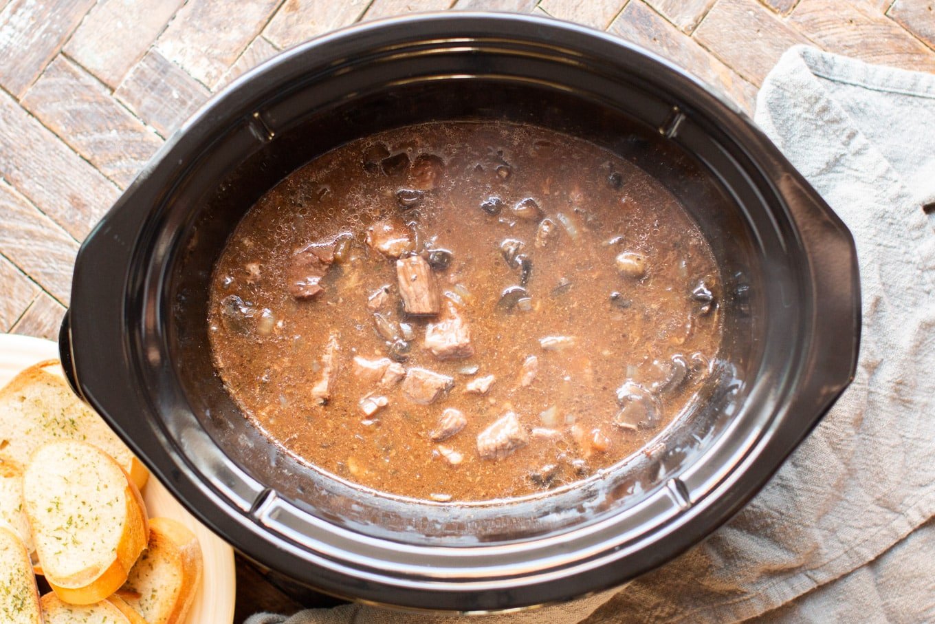 cooked gravy, beef, mushrooms and onions, before adding the sour cream and egg noodles.