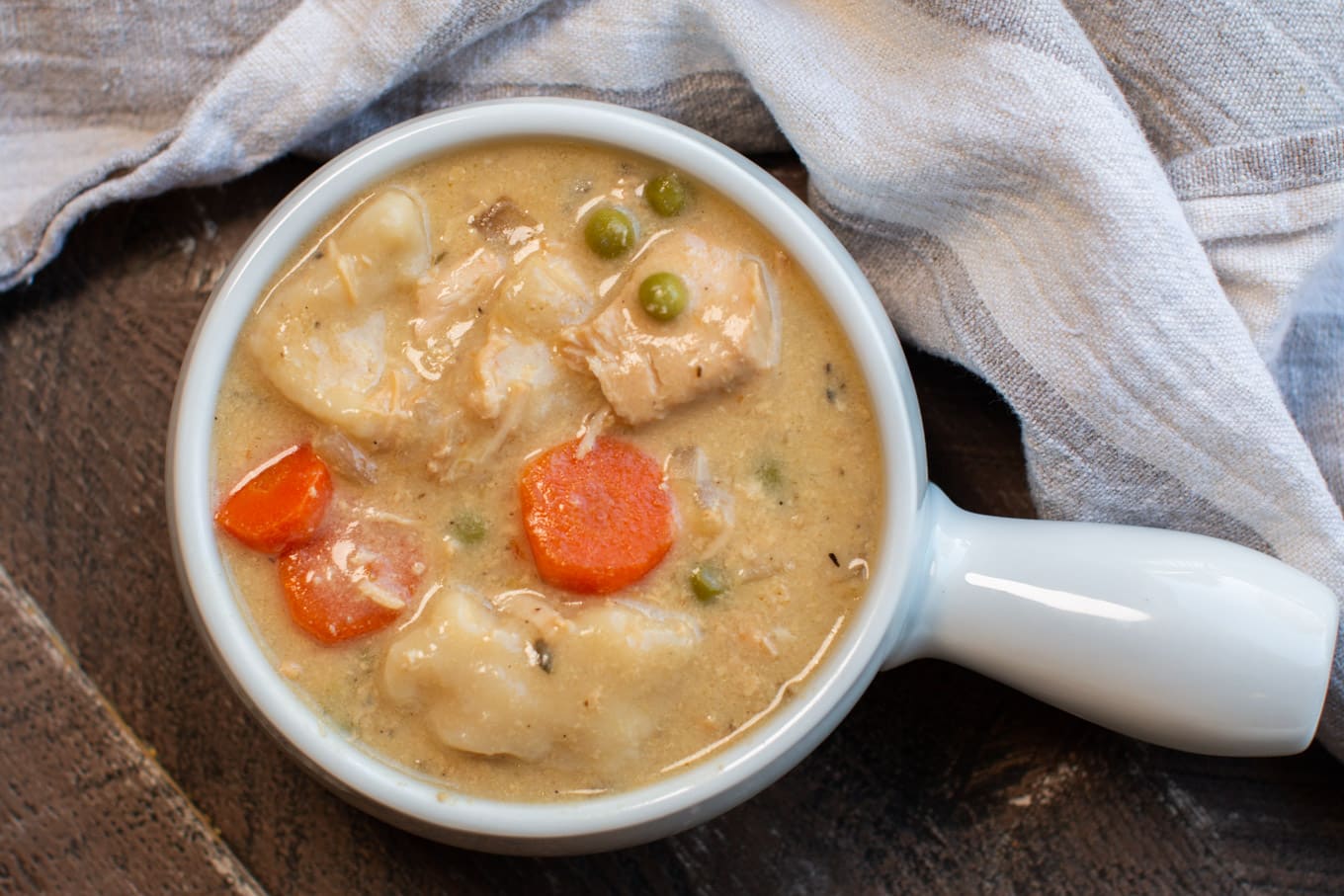 close up of chicken and dumplings in bowl