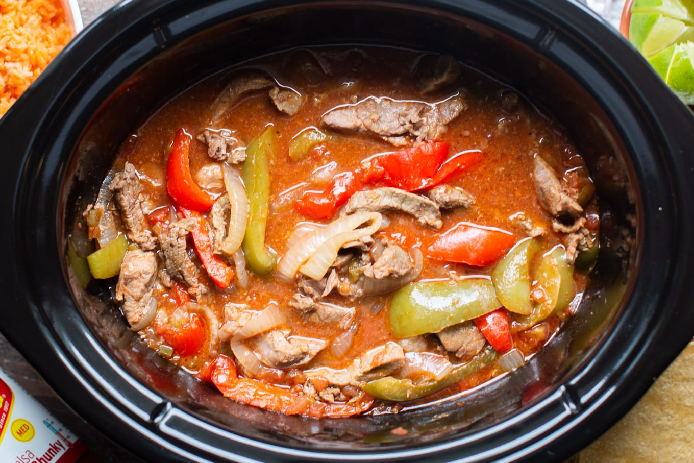 close up beef fajitas in slow cooker