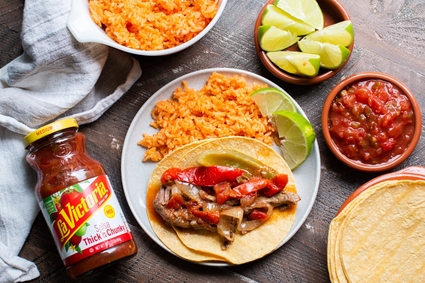 plated fajitas with rice and lime