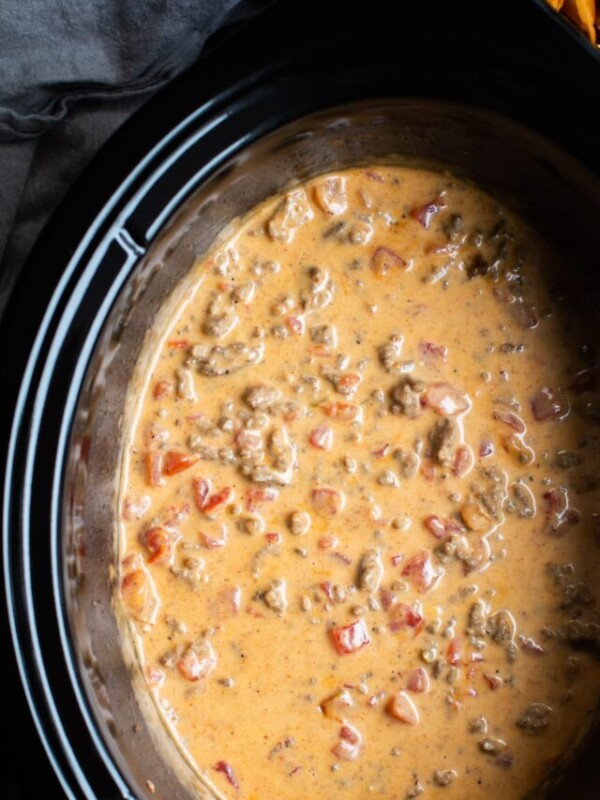 Rotel dip done cooking in the slow cooker.
