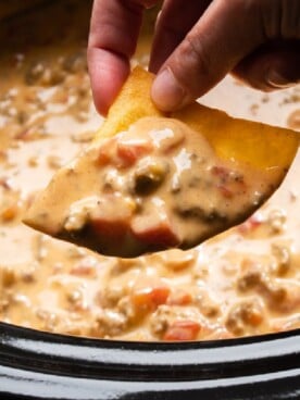 close up of rotel dip on a chip