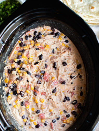 close up image of fiesta chicken in slow cooker