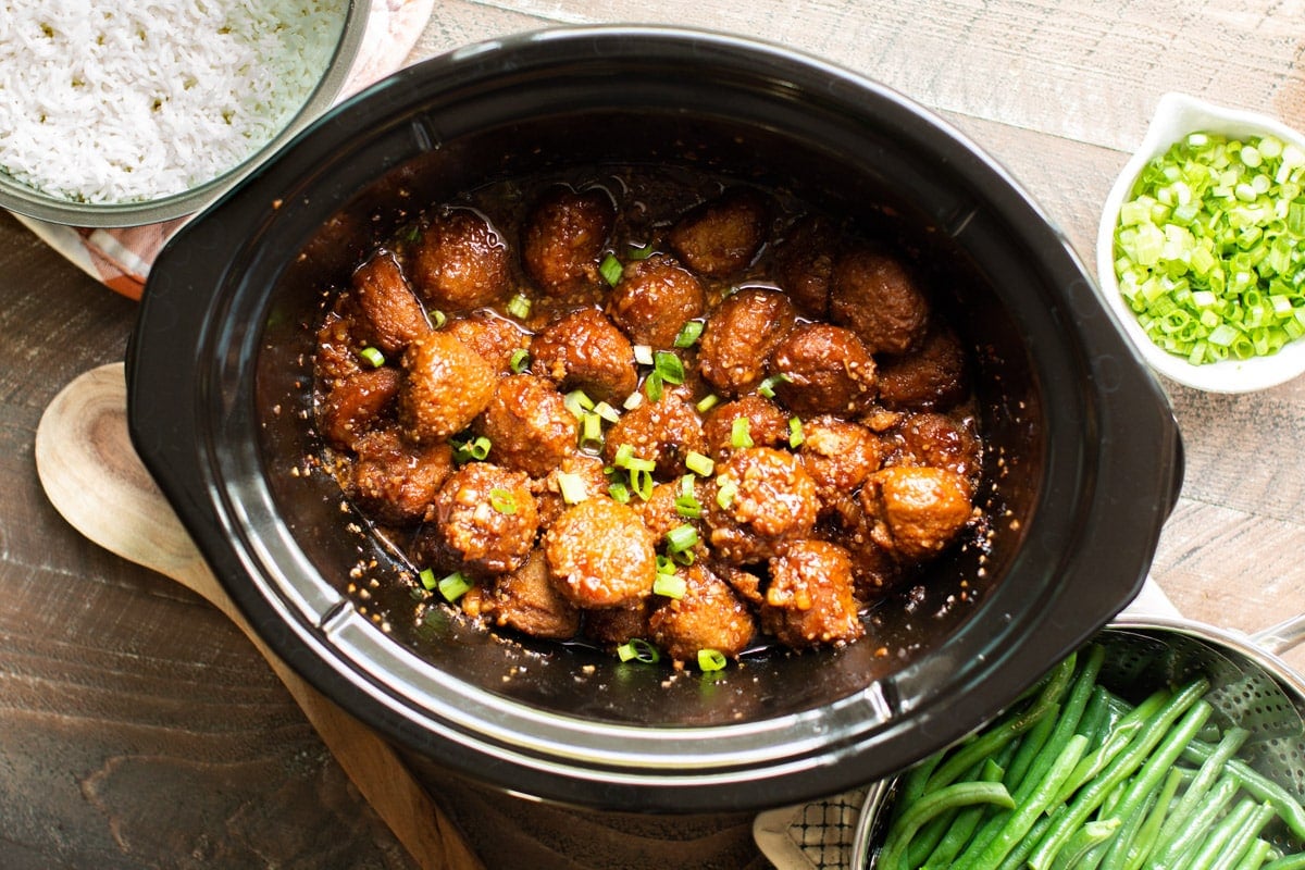 finished cooking teriyaki meatballs with green onions on top