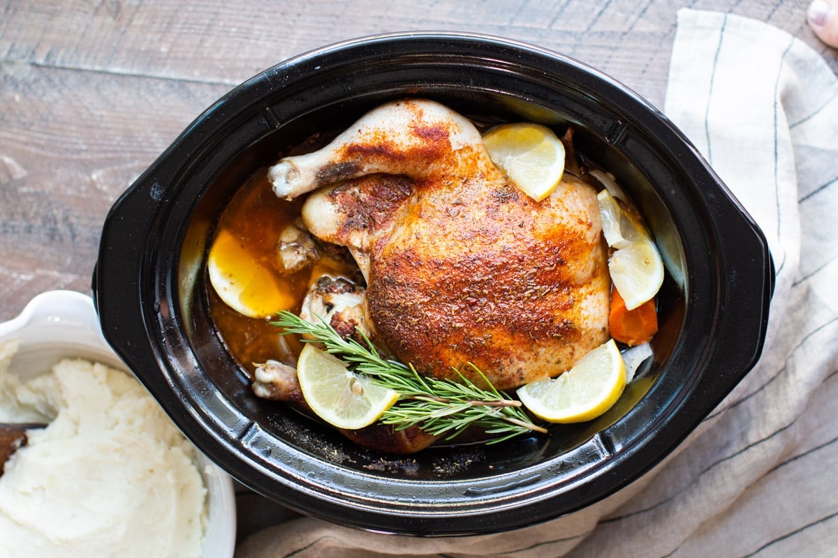 finished cooking whole chicken in a slow cooker