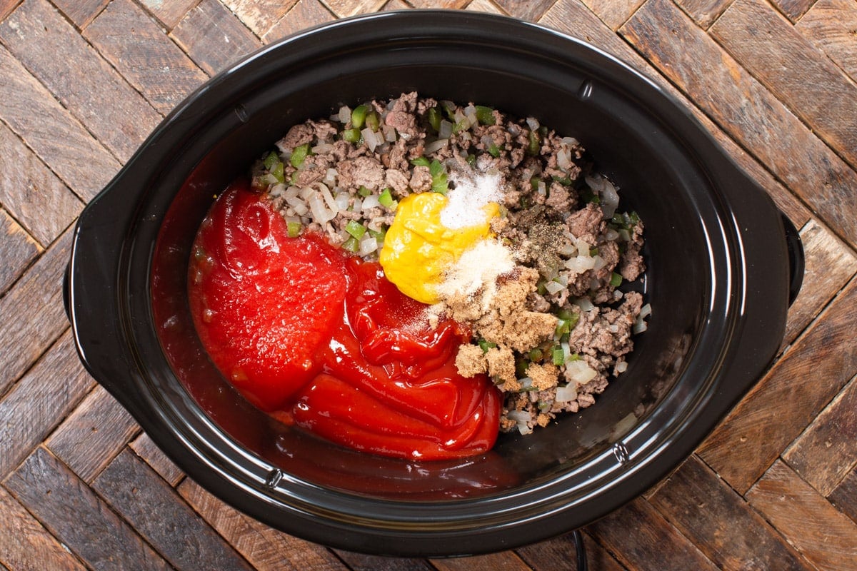 beef, ketchup, tomato sauce, mustard and seasonings in slow cooker