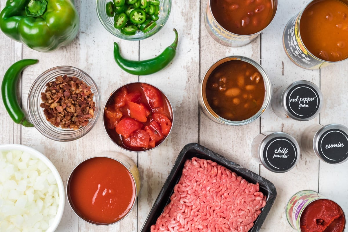 ingredients for hot chili on white table