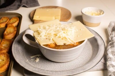 bowl of french onion with cheese, not yet broiled