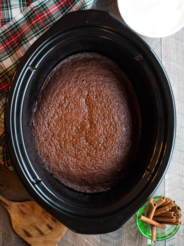 close up of cooked gingerbread cake in slow cooker