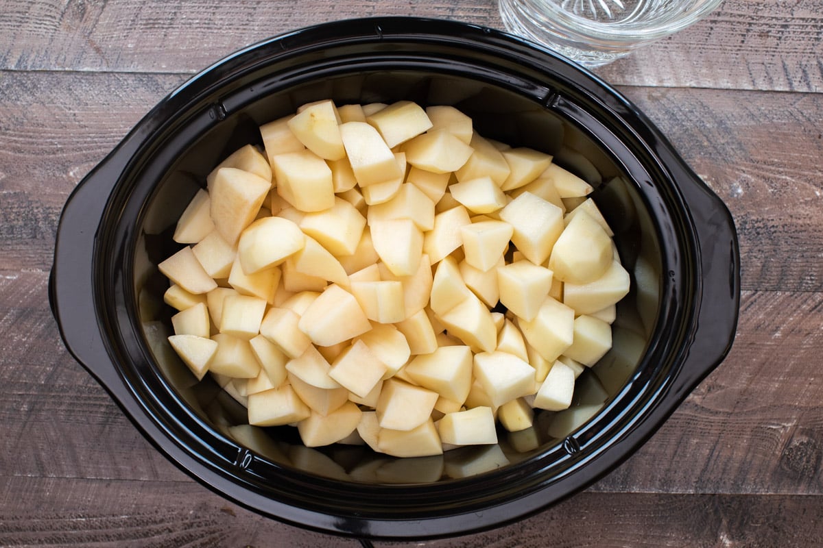 peeled and cubed russet potatoes in slow cooker