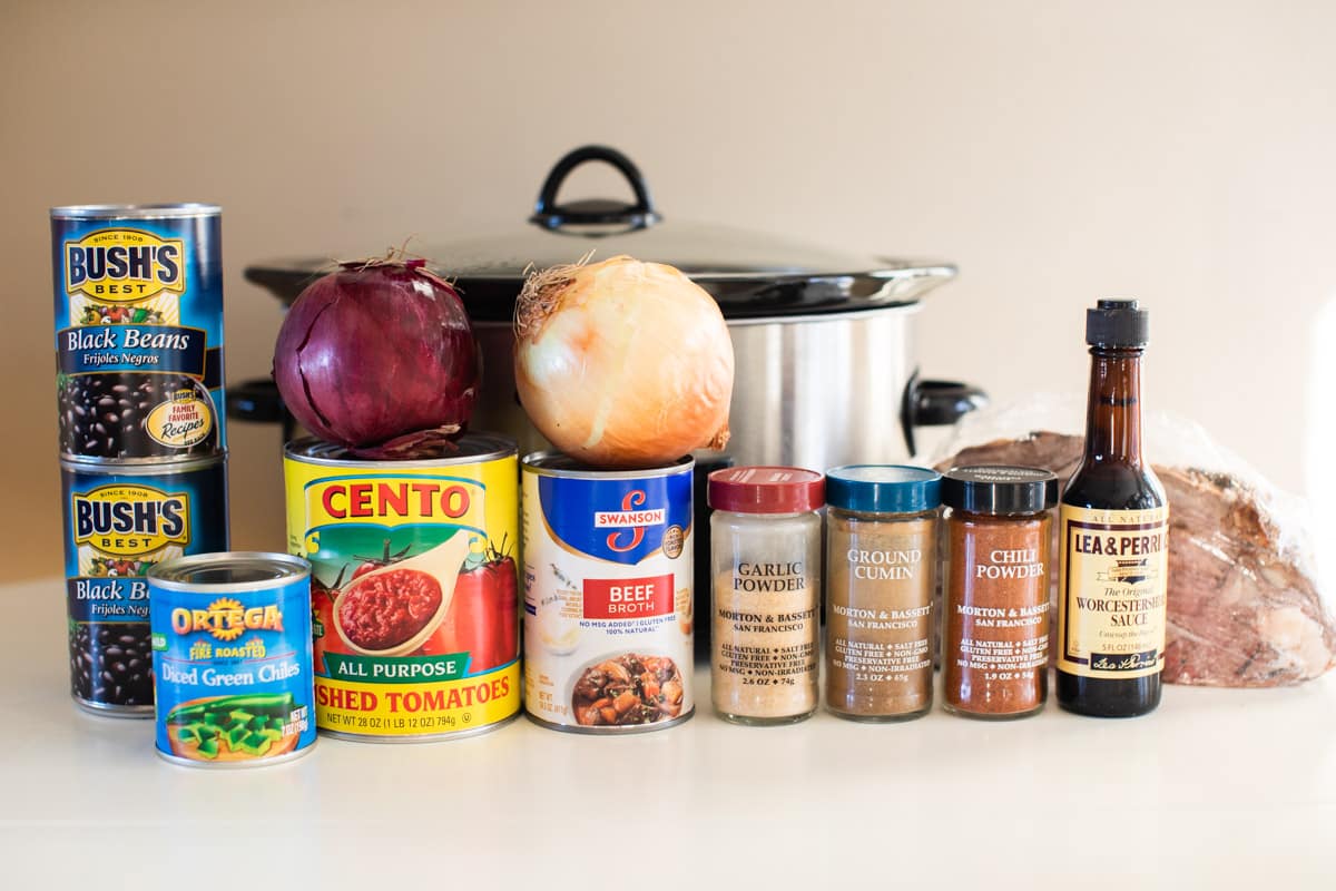 ingredients for prime rib chili in front of a slow cooker