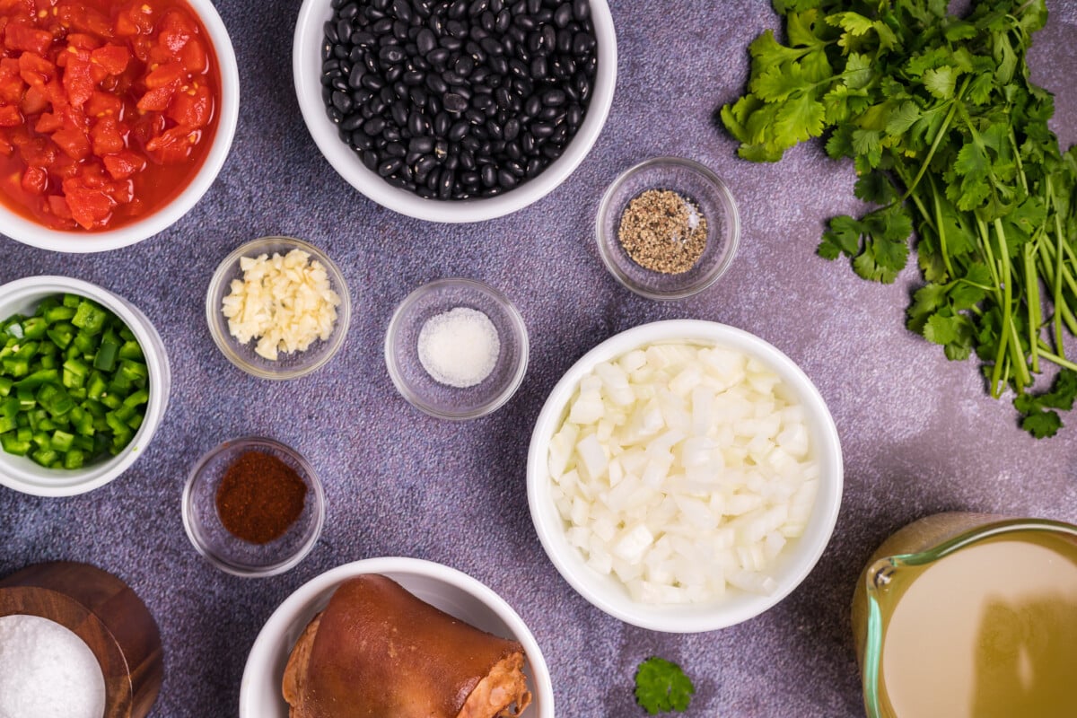ingredients for black bean soup on table.