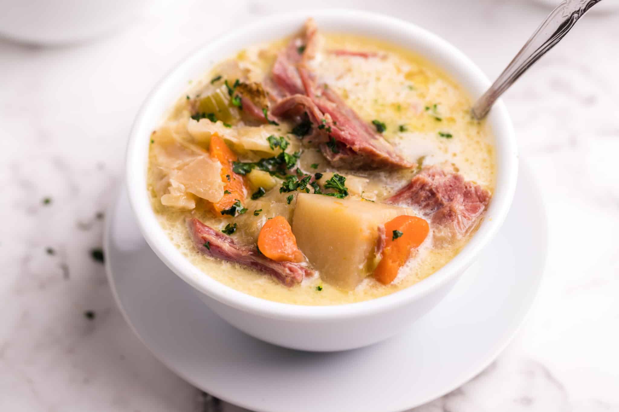 bowl of corned beef and cabbage soup