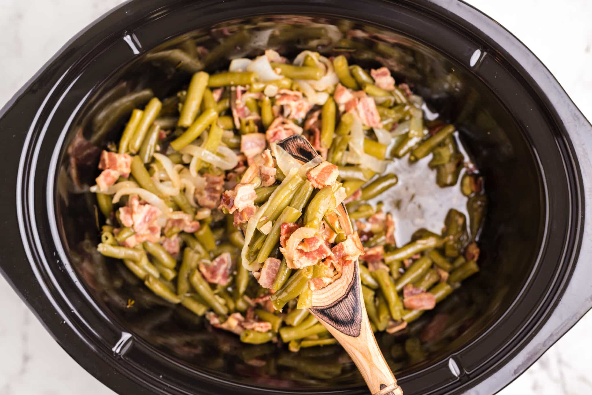 cooked green beans and bacon in slow cooker
