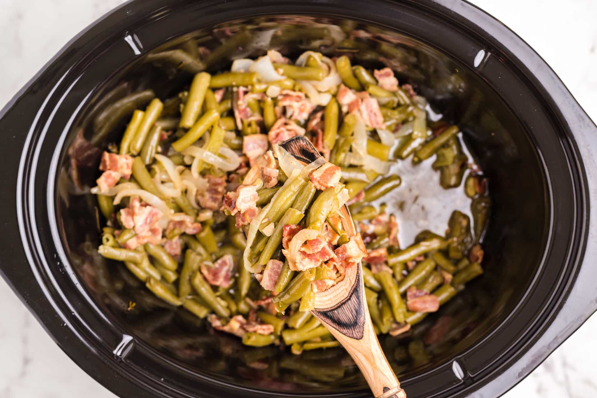 cooked green beans and bacon in slow cooker