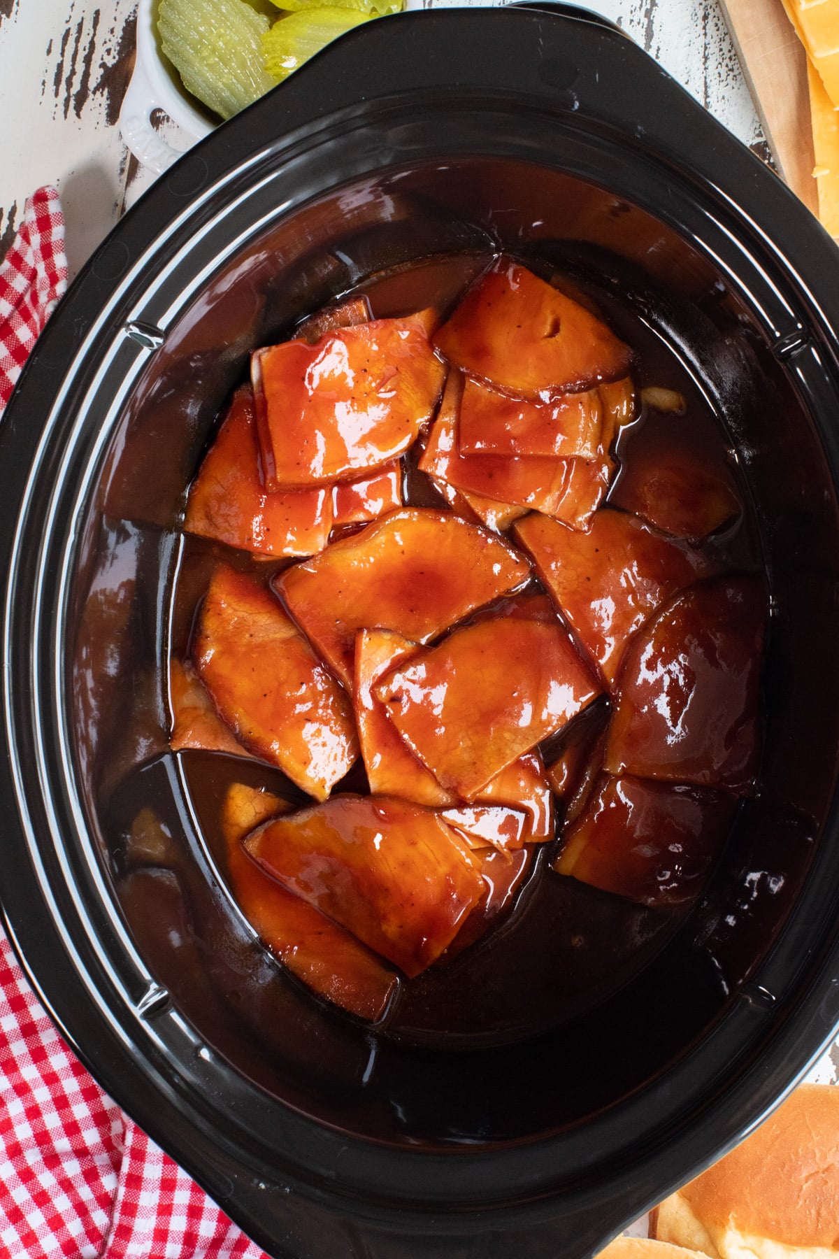 close up of barbecue ham in slow cooker