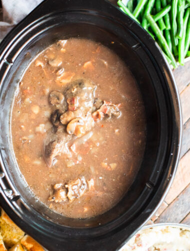 cooked venison roast in mushroom bacon gravy