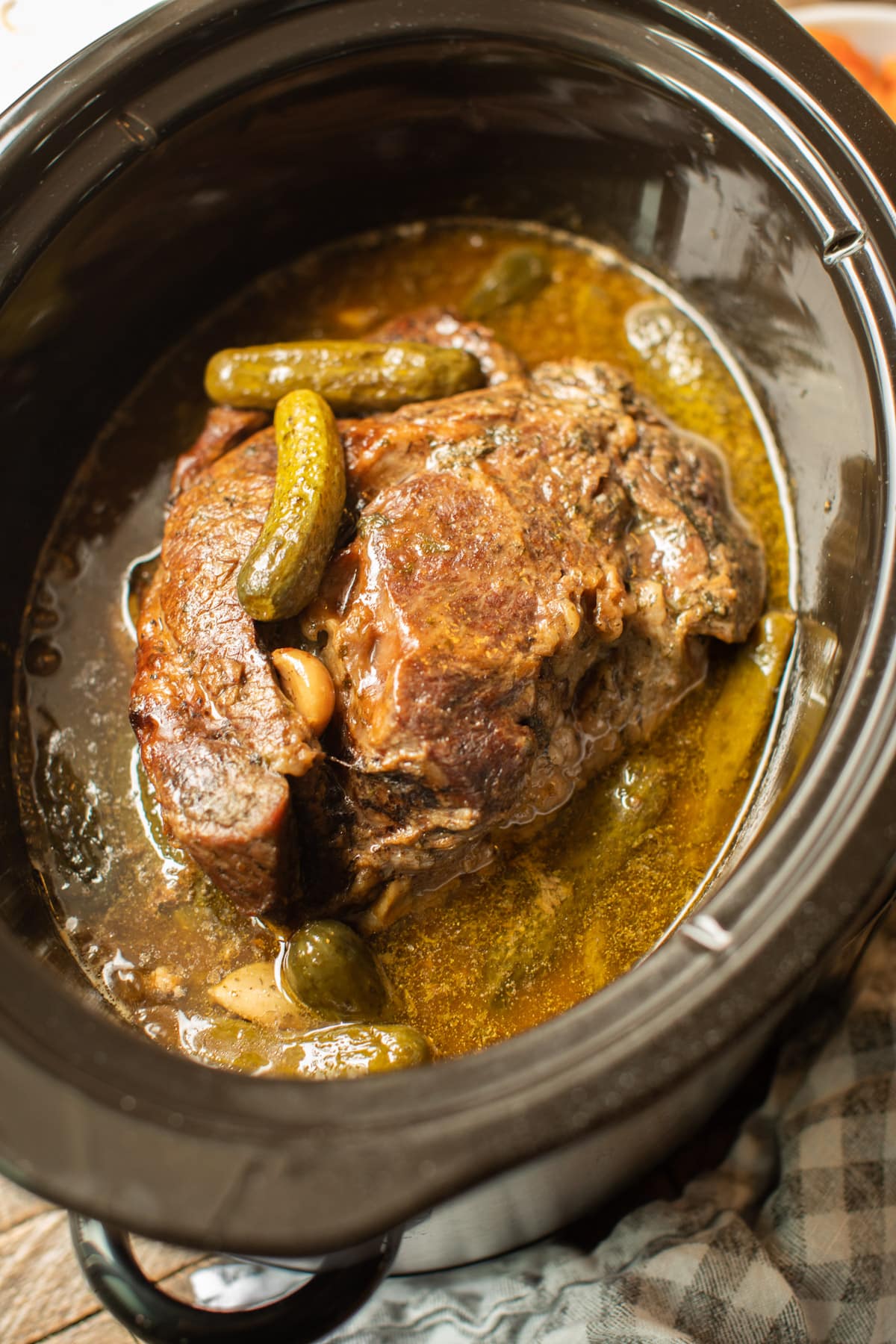 finished cooking dill pickle roast in the slow cooker