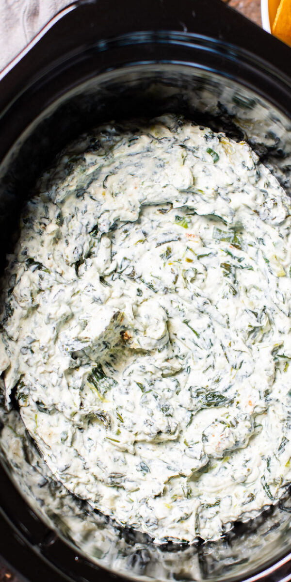 long image of spinach dip in slow cooker for pinterest