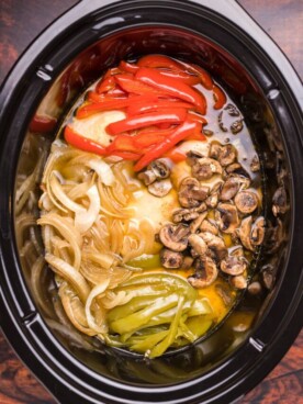 chicken philly meat and vegetables in slow cooker.