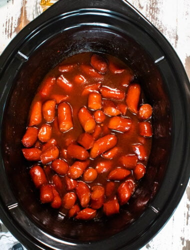 close up image of cooked bourbon hot dogs