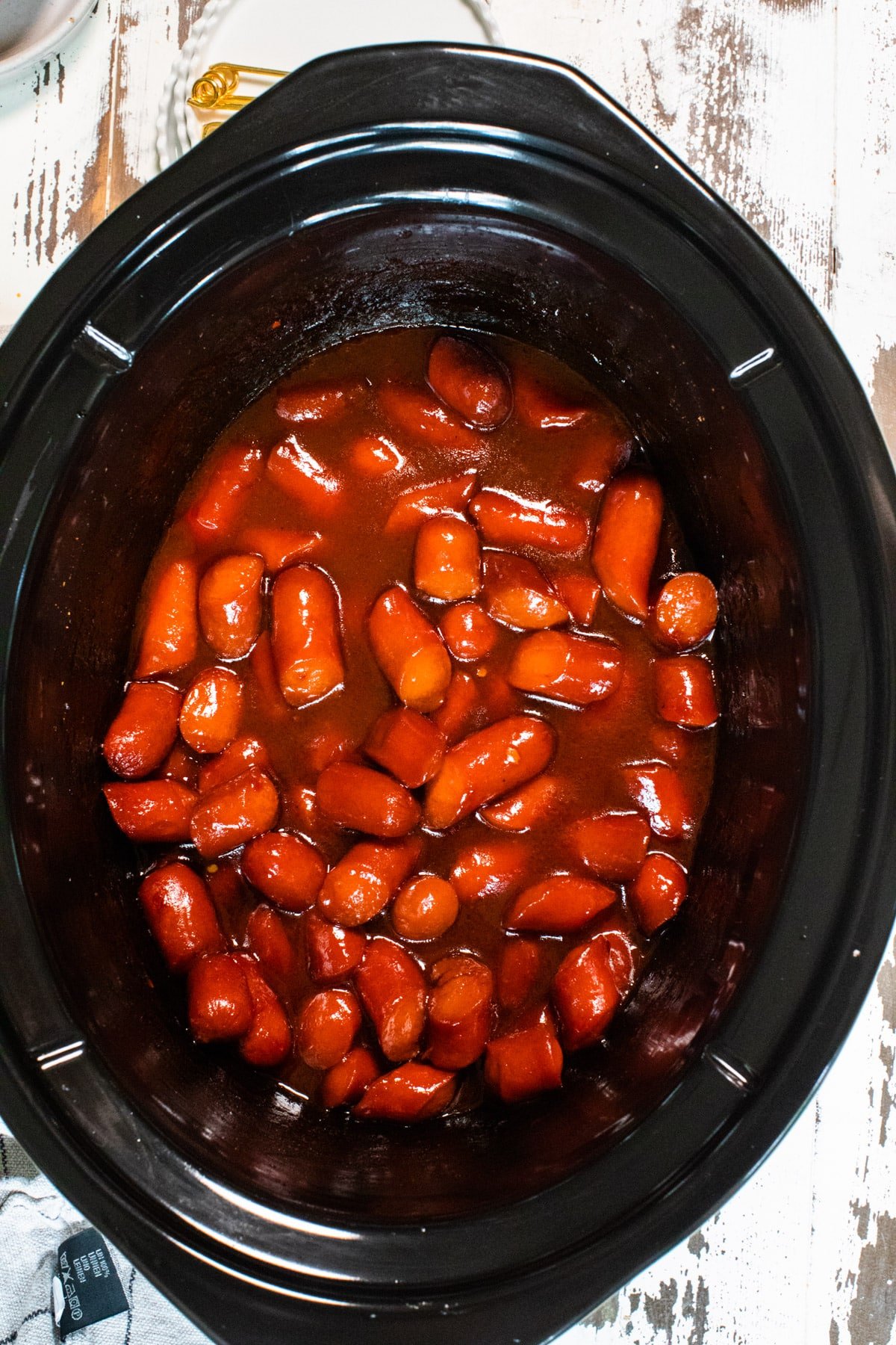 close up image of cooked bourbon hot dogs
