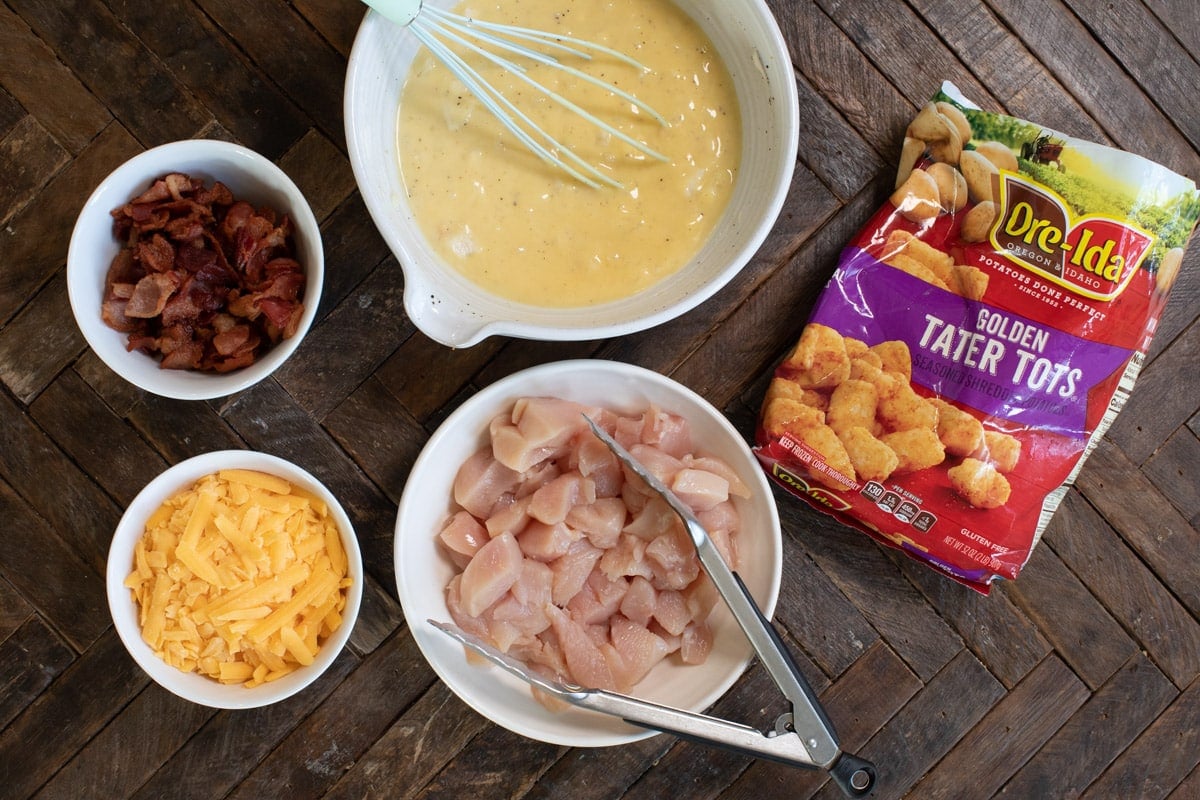 ingredients for chicken tater tot casserole on wooden table