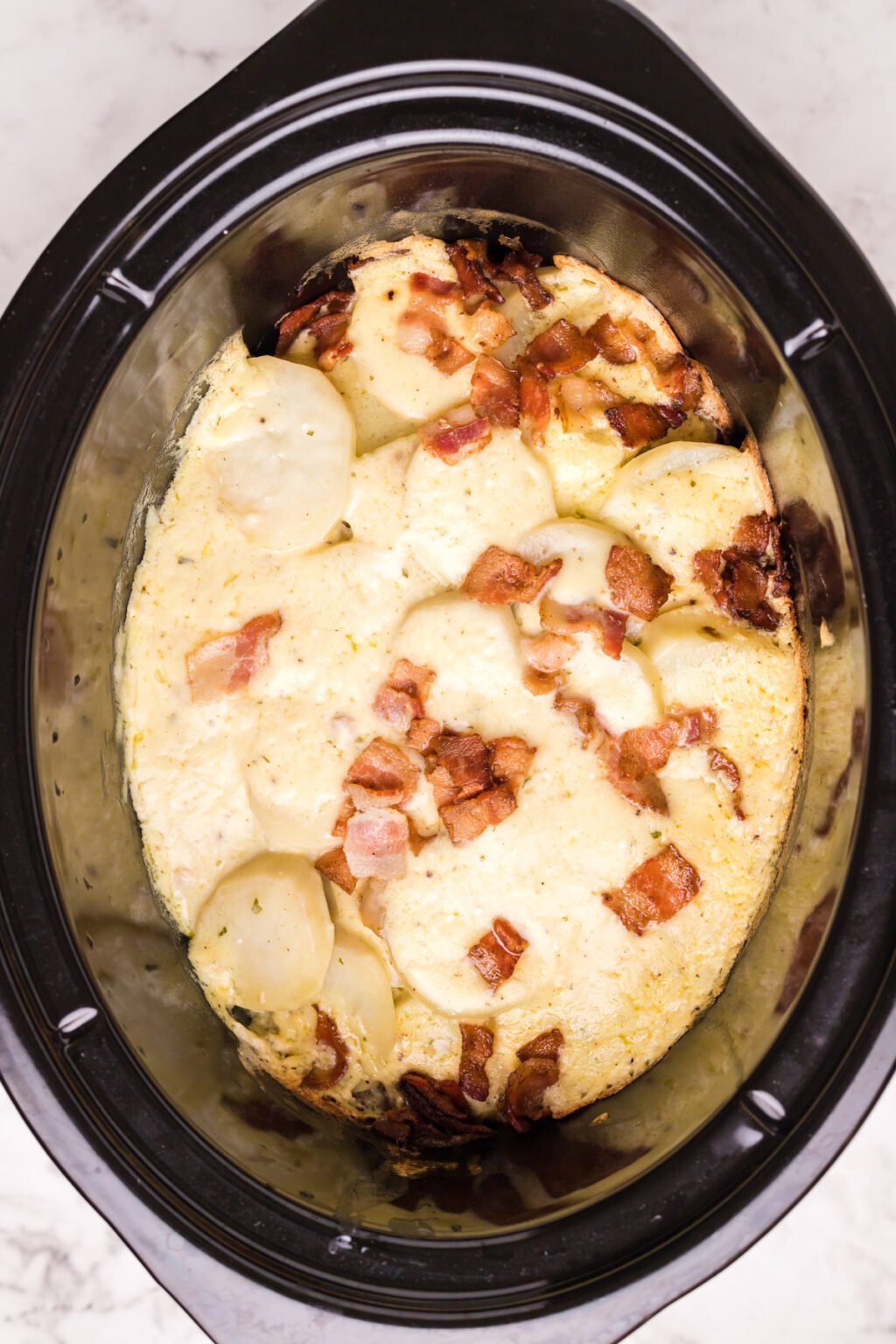 Creamy Slow Cooker Scalloped Potatoes Recipe - The Magical Slow Cooker