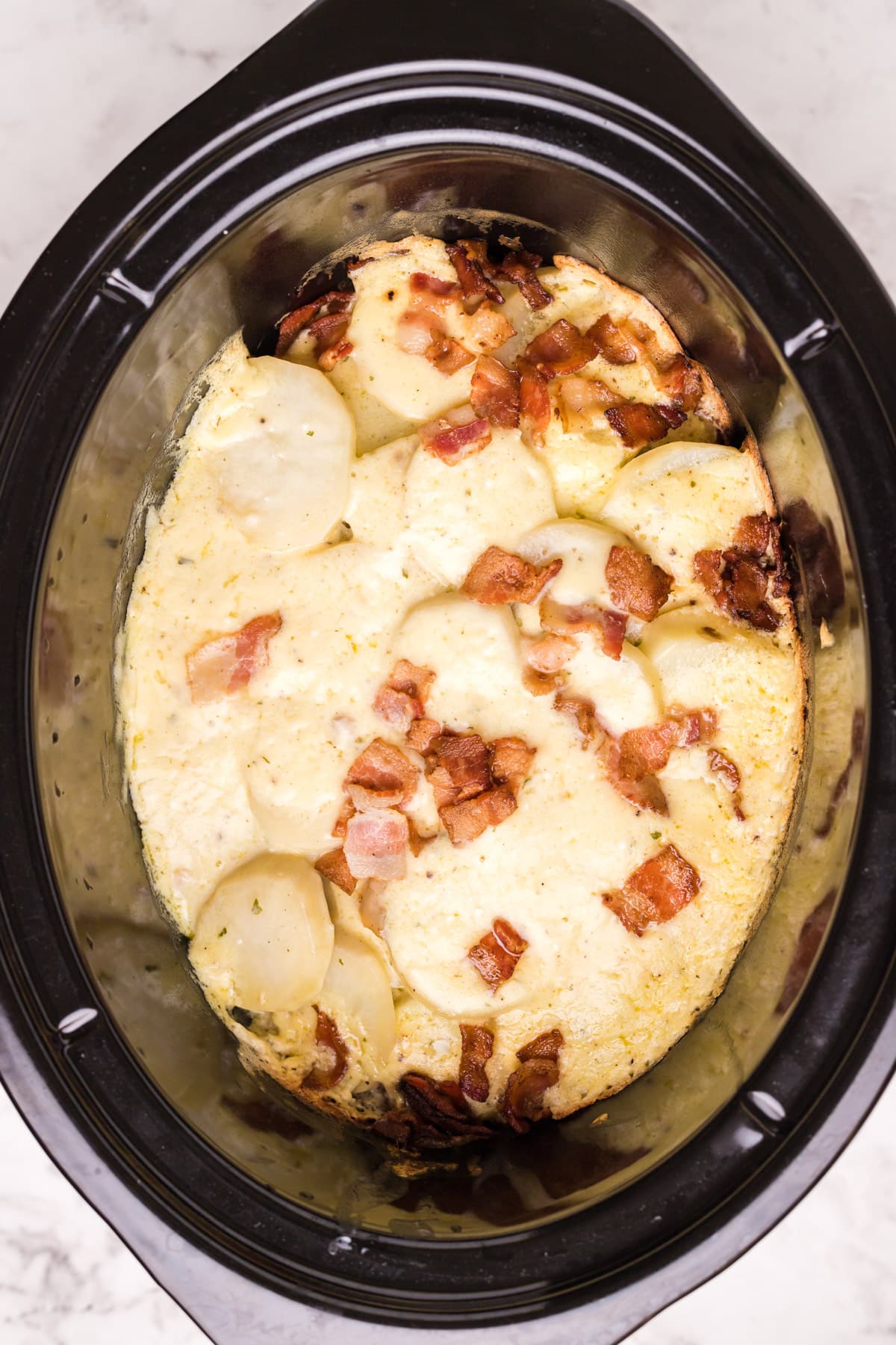 cooked scalloped potatoes in slow cooker