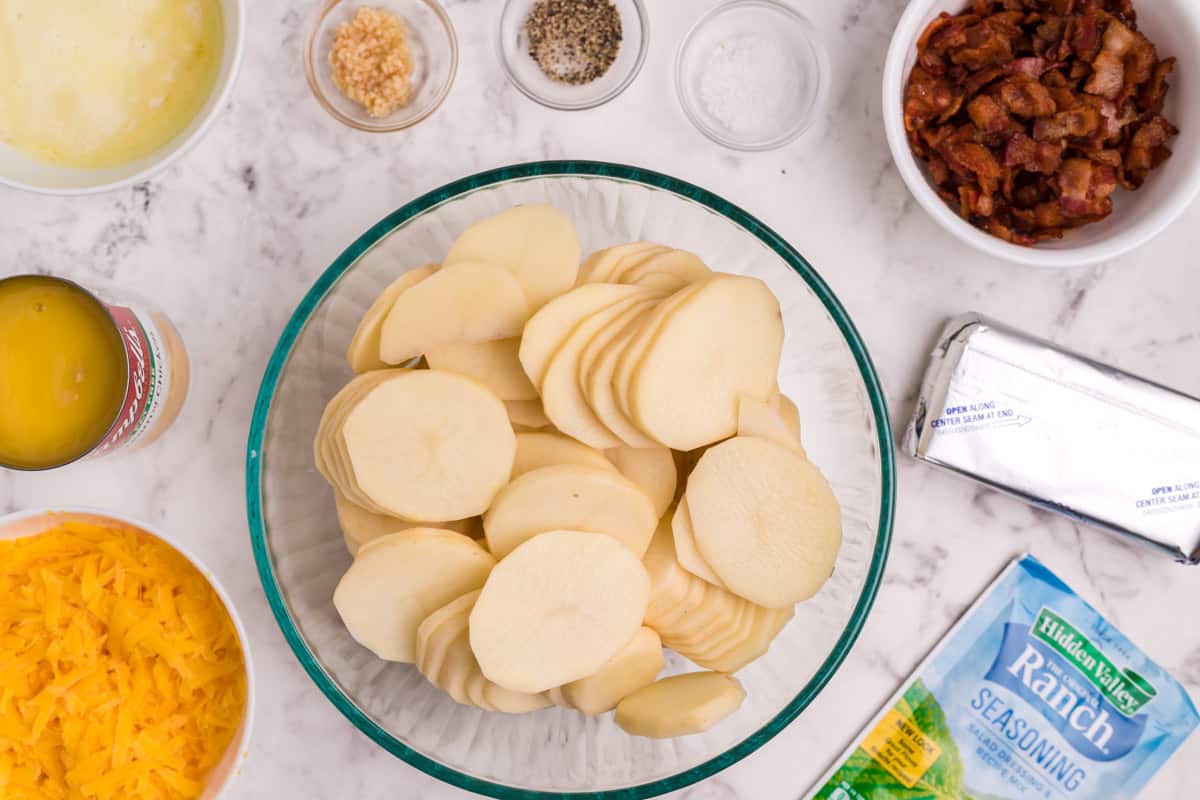 sliced potatoes and other ingredients for crack potatoes